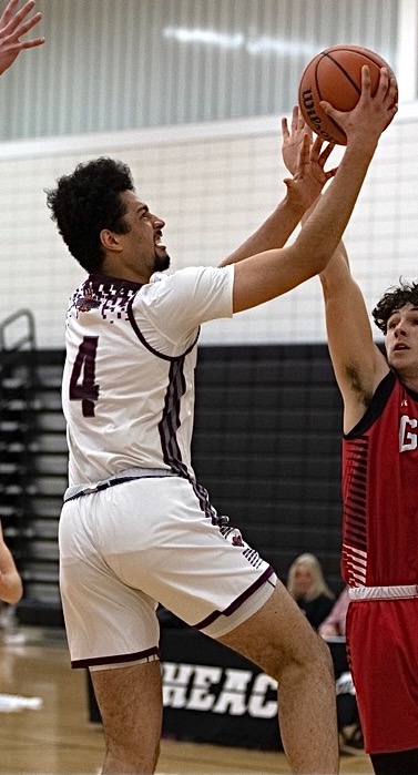 Check out the photos and videos of the men's basketball recruiting profile Ira Wilson